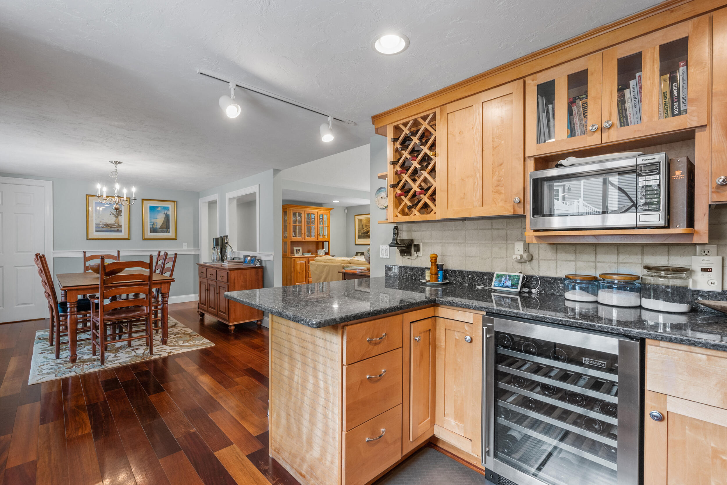 10 Neshobe Road Mashpee, MA 02649 - Photo 6 of 40 a kitchen with stainless steel appliances granite countertop a sink and cabinets