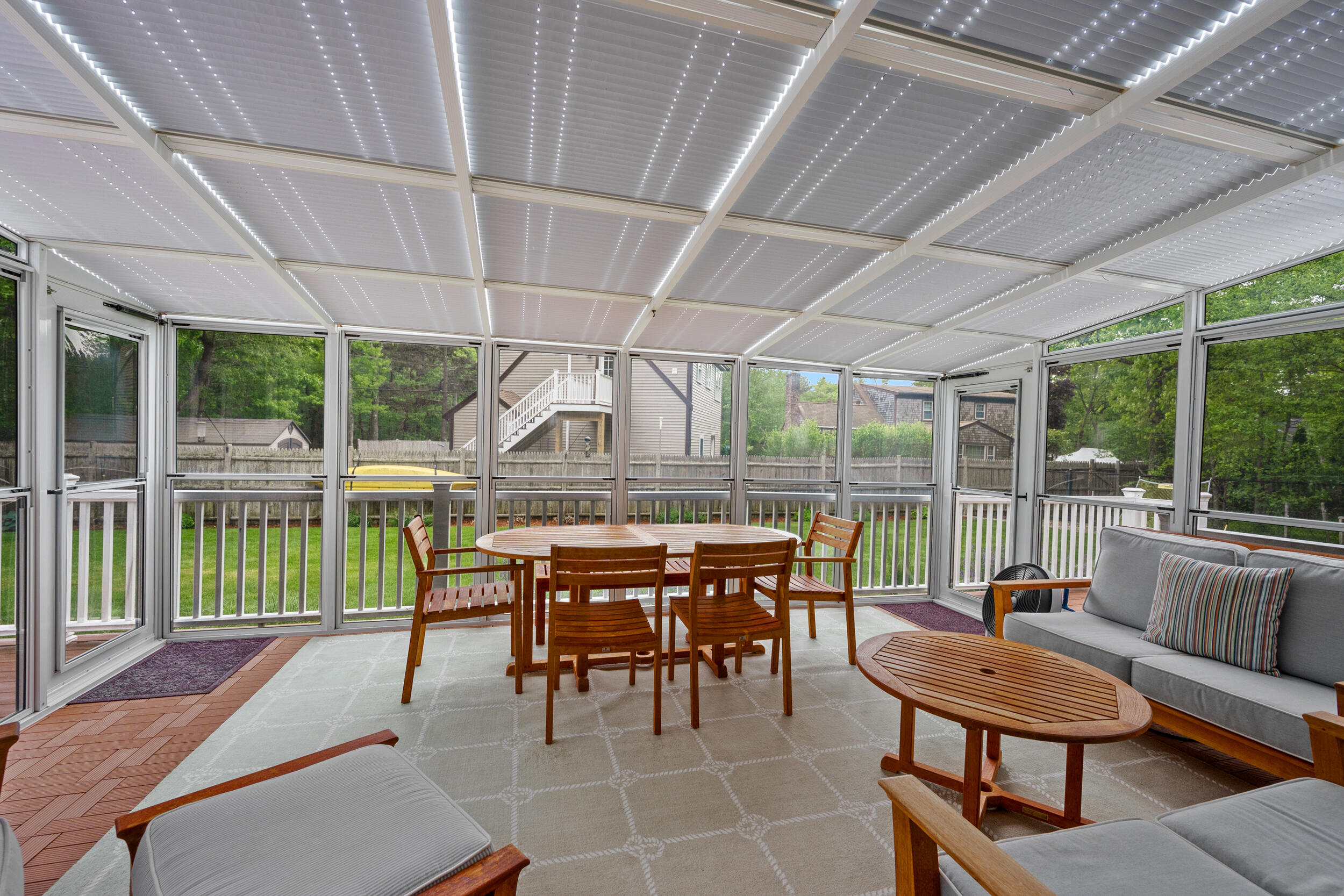 10 Neshobe Road Mashpee, MA 02649 - Photo 9 of 40 a outdoor space with chairs a couch and a swing