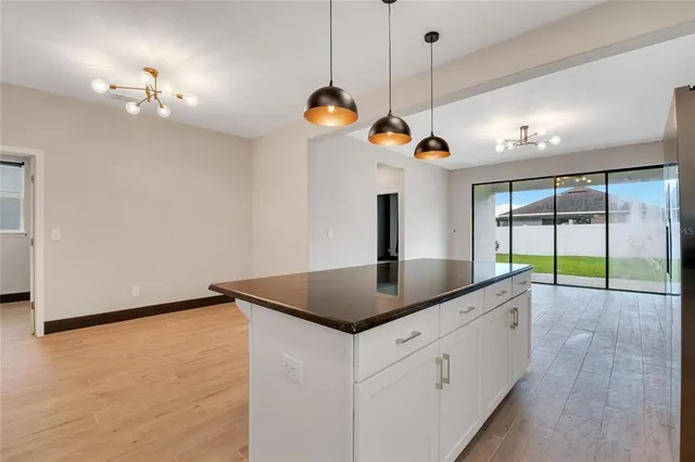 a view of a livingroom with a ceiling fan