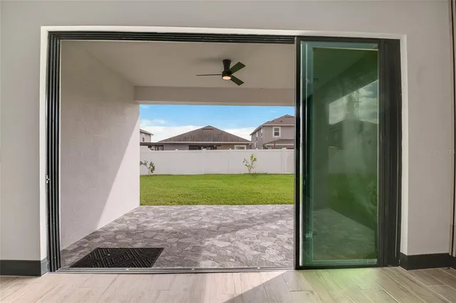 a view of a room with a hallway