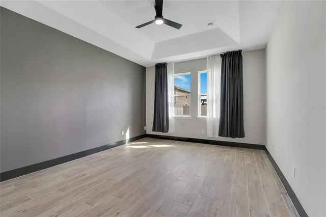 a kitchen with stainless steel appliances granite countertop a sink and a stove