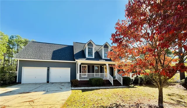 a front view of house with yard