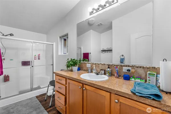 a bathroom with a sink and a mirror