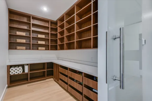 a view of an empty walk in closet