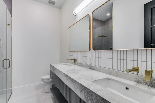 a bathroom with a sink and a toilet