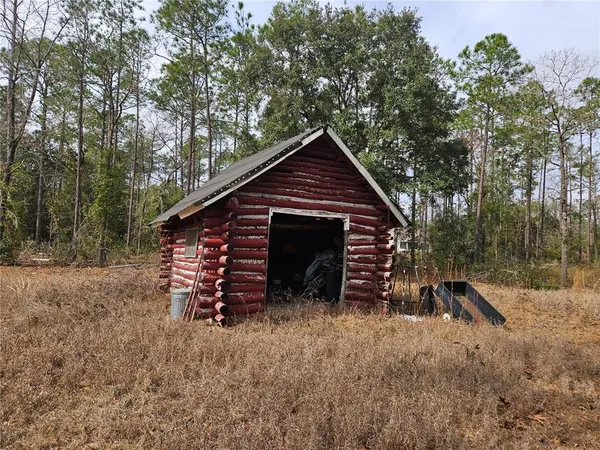 a view of backyard of house