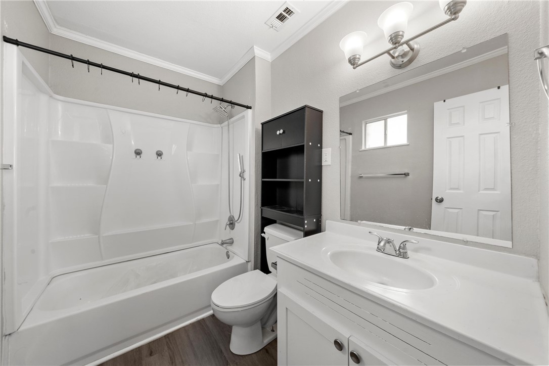 3234 Ferndale Drive Waco, TX 76706 - Photo 12 of 17 a bathroom with a sink toilet and shower