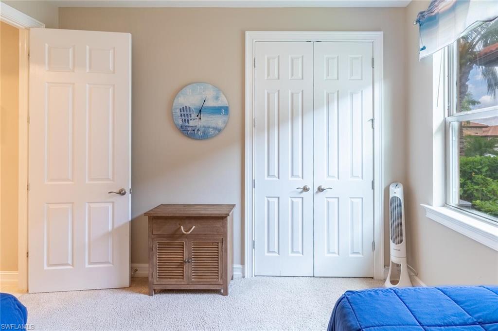 16366 Barclay Court Naples, FL 34110 - Photo 24 of 35 a view of front door with hallway