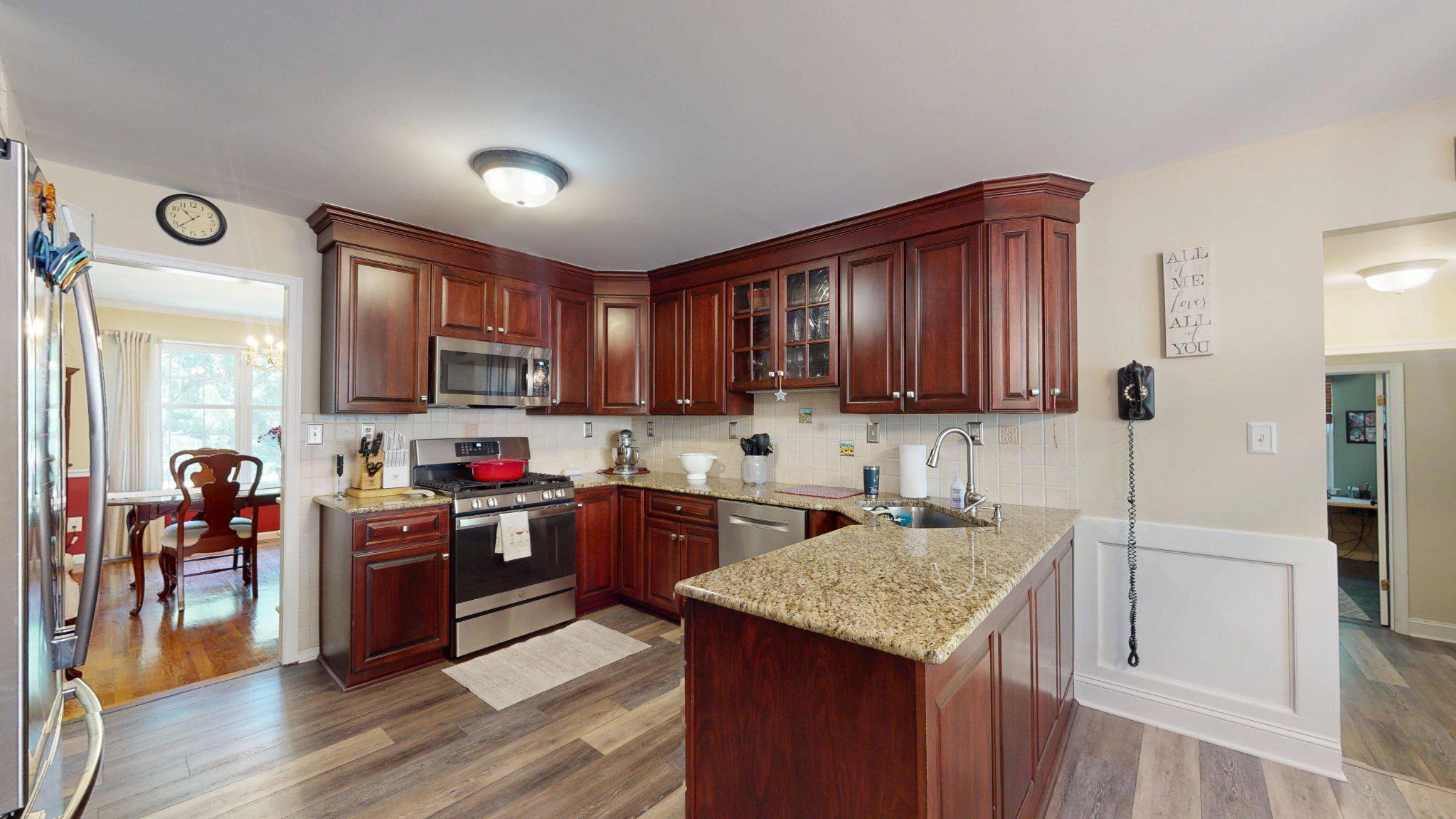 3 Colonial Court Medford, NJ 08055 - Photo 19 of 89 Elegant kitchen with rich wood tones.