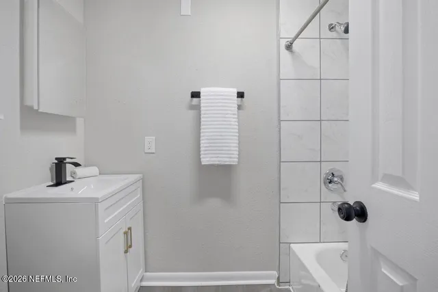 a bathroom with a sink and a toilet