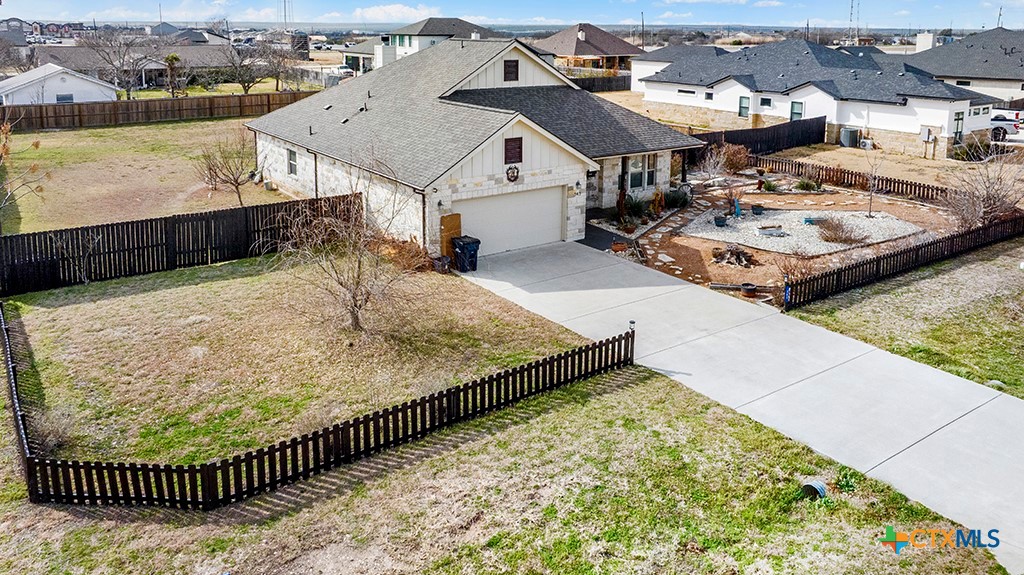 343 Meadow Valley Loop Jarrell, TX 76537 - Photo 2 of 33 swimming pool view with a lake view