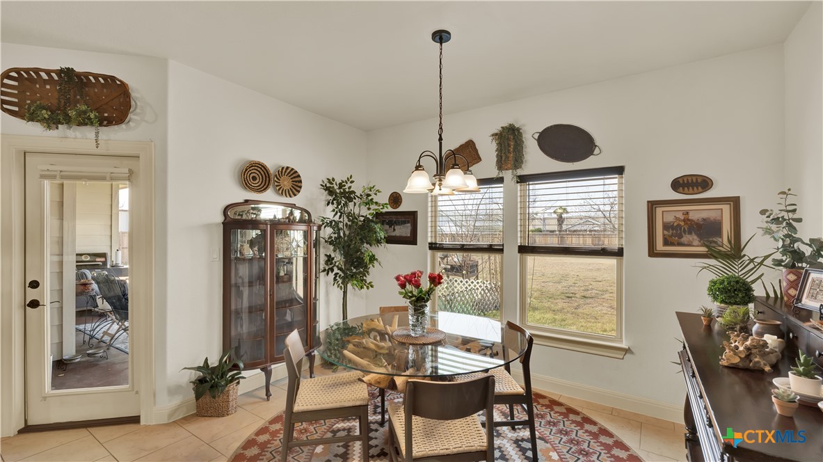 343 Meadow Valley Loop Jarrell, TX 76537 - Photo 23 of 33 a view of a livingroom with furniture and a window