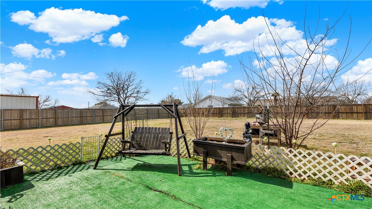 343 Meadow Valley Loop Jarrell, TX 76537 - Photo 31 of 33 a view of a park with a slide