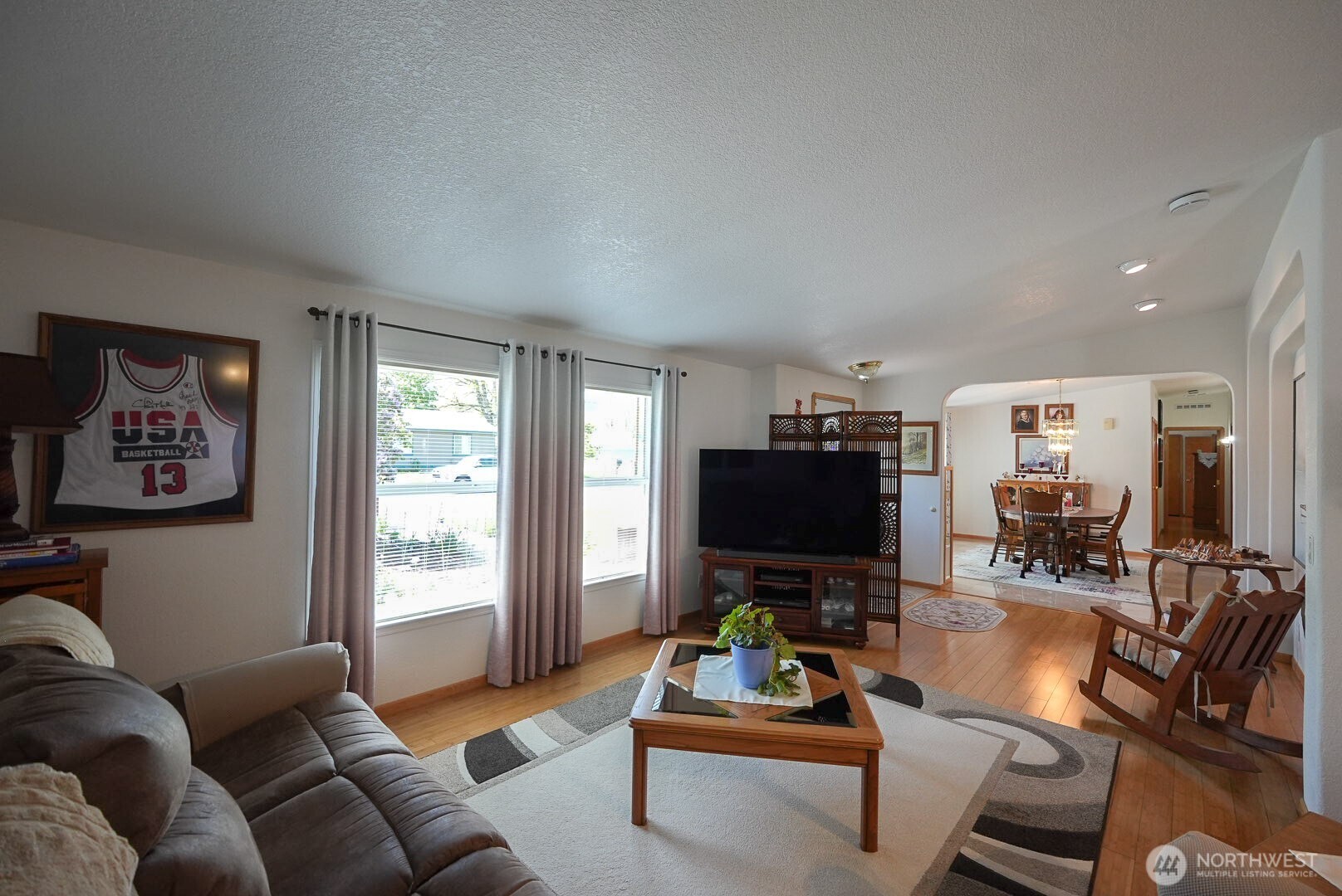 201 South Cherry Street Dayton, WA 99328 - Photo 15 of 23 a living room with furniture and a flat screen tv