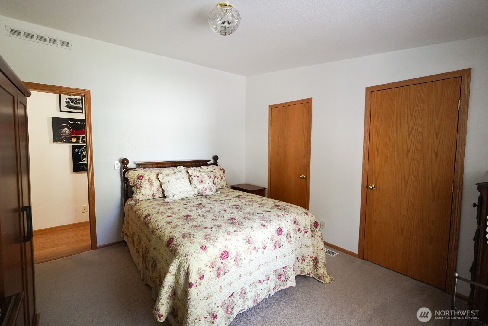 201 South Cherry Street Dayton, WA 99328 - Photo 18 of 23 a bedroom with a bed and painting on the wall