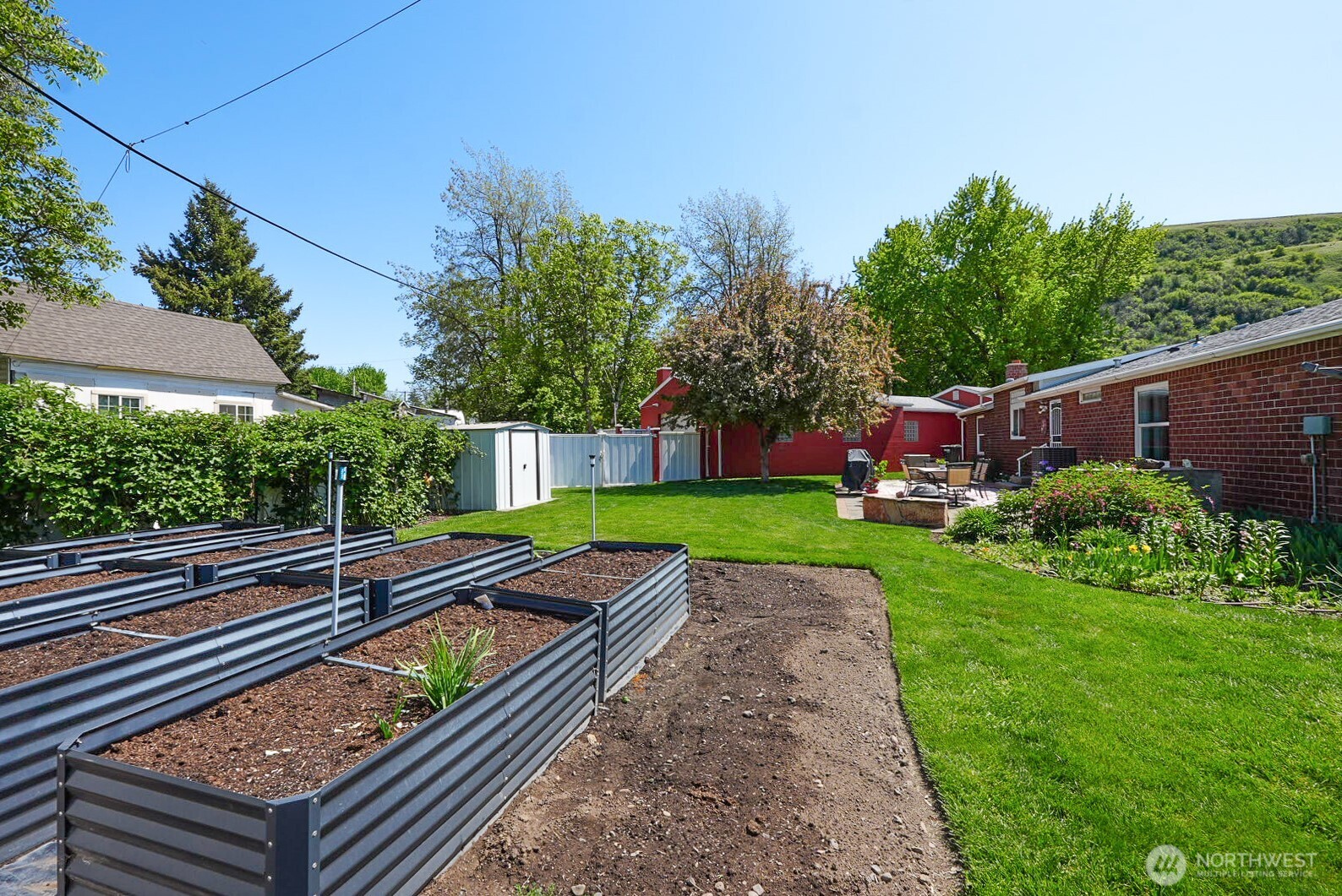 201 South Cherry Street Dayton, WA 99328 - Photo 4 of 23 a view of an outdoor space with a garden