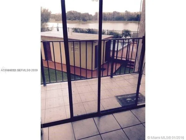 a view of a balcony with an outdoor space