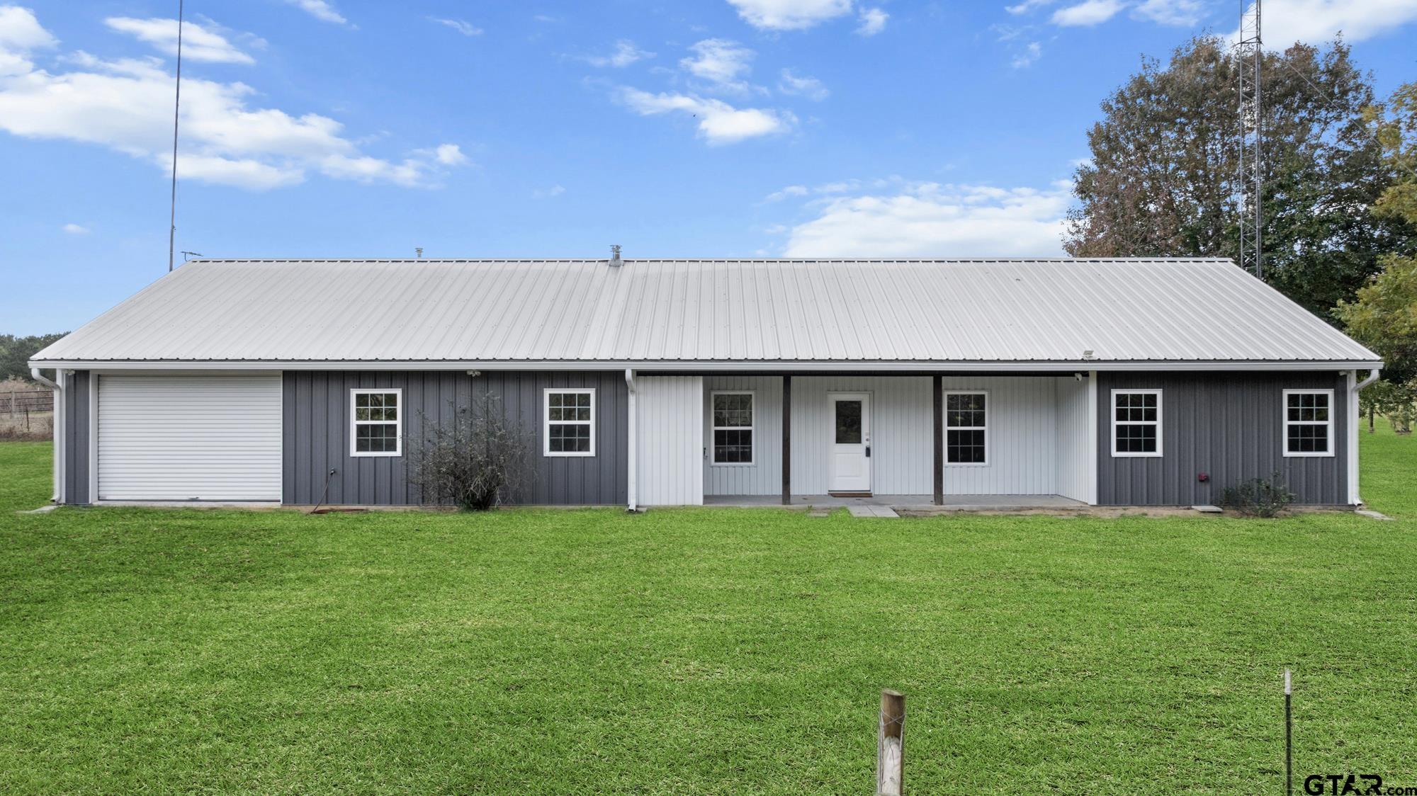 732 Red Maple Road Big Sandy, TX 75755 - Photo 20 of 40 a front view of a house with a yard
