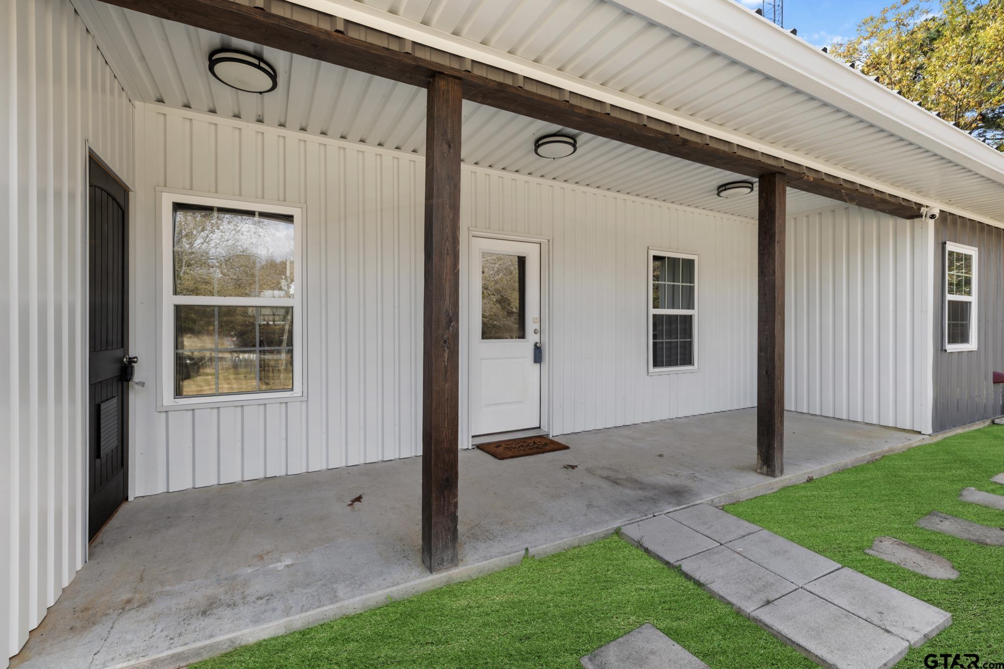 732 Red Maple Road Big Sandy, TX 75755 - Photo 23 of 40 a view of a house with a small yard and wooden fence