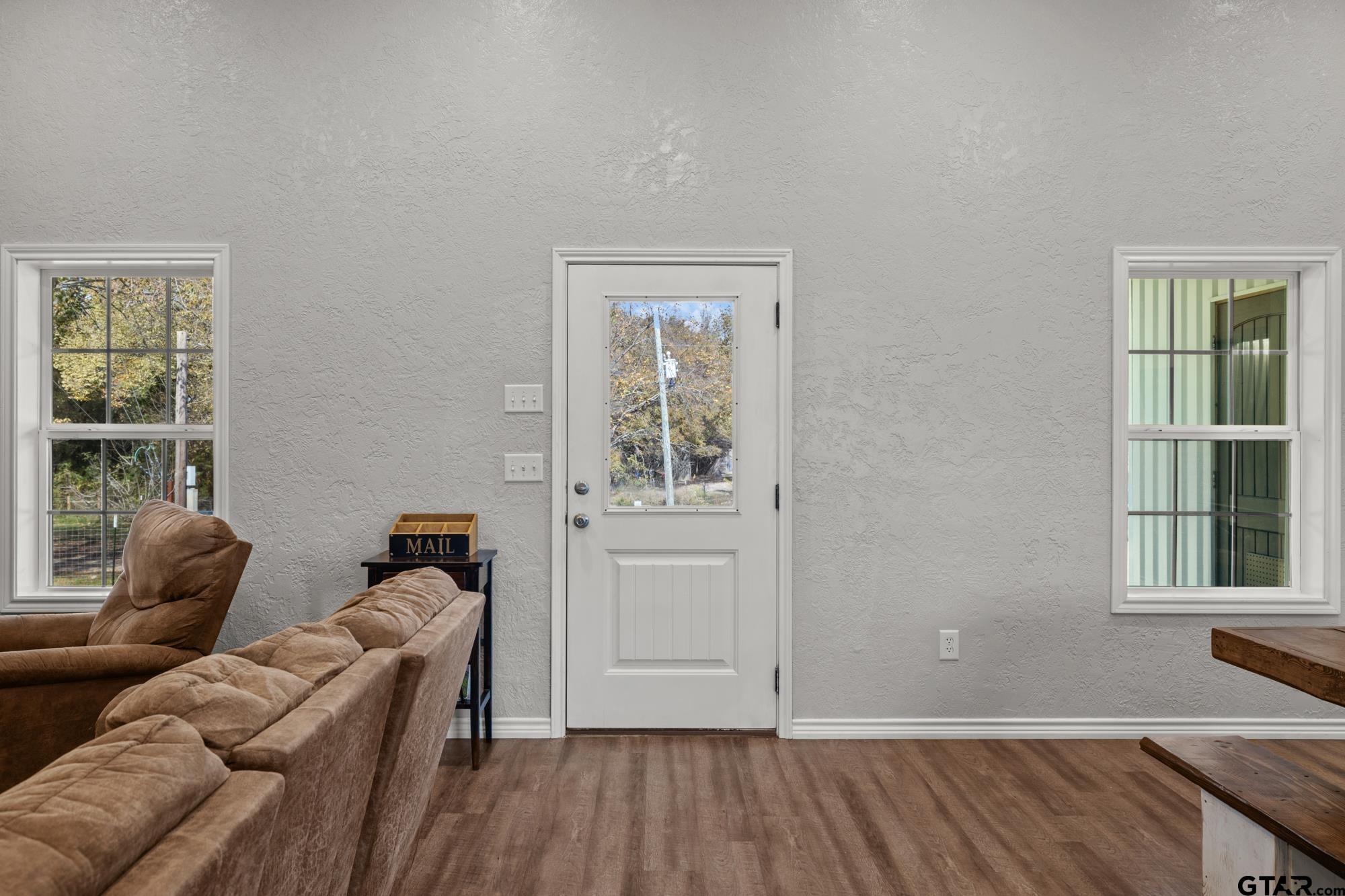 732 Red Maple Road Big Sandy, TX 75755 - Photo 24 of 40 a living room with furniture and a window