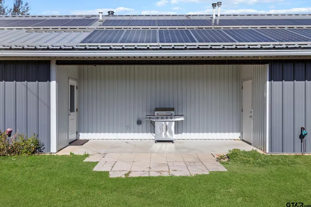 a view of a back yard of the house