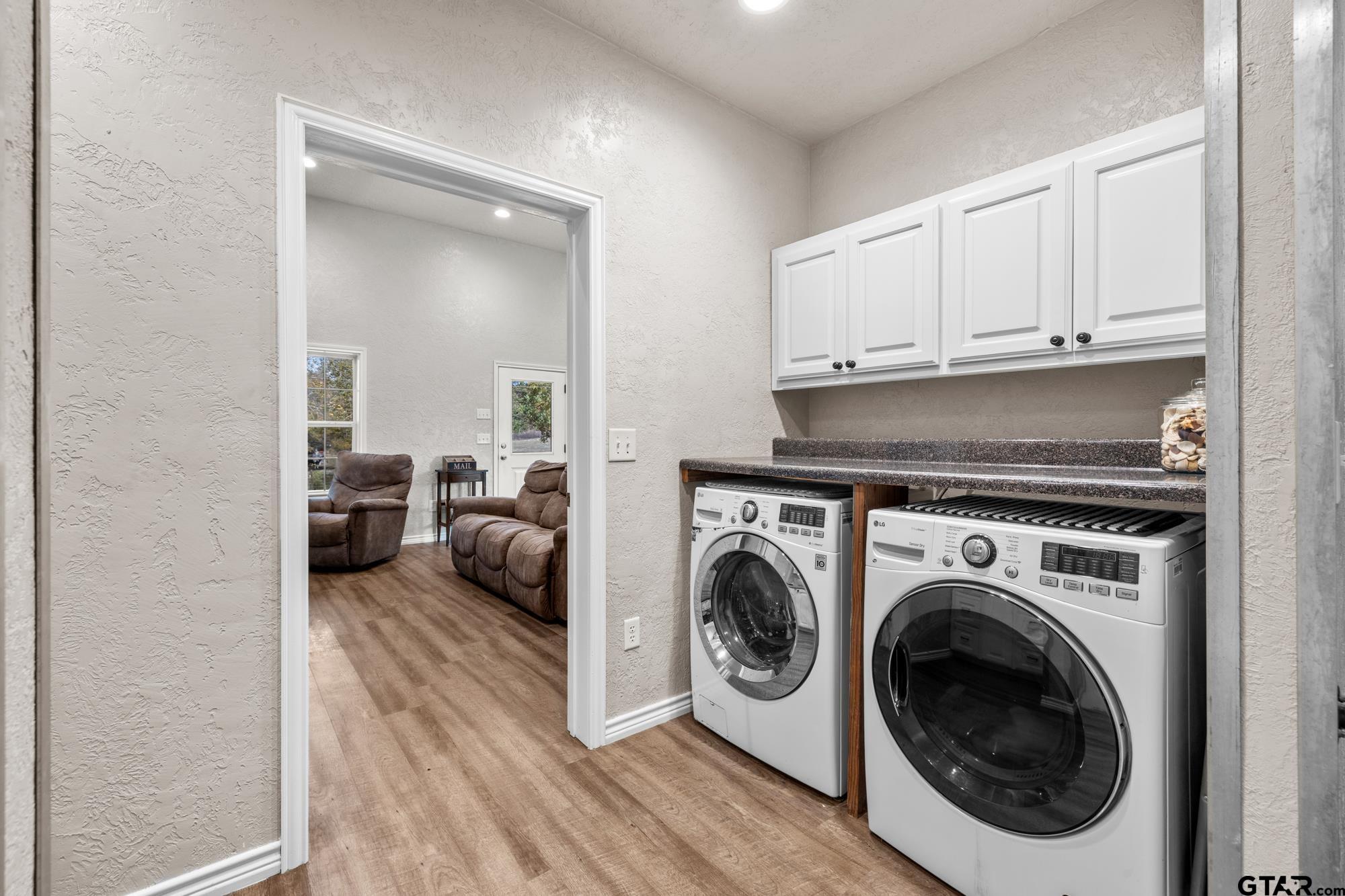 732 Red Maple Road Big Sandy, TX 75755 - Photo 33 of 40 a view of living room washer and dryer