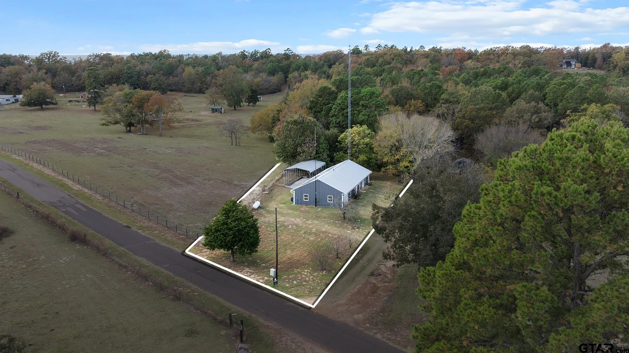 732 Red Maple Road Big Sandy, TX 75755 - Photo 5 of 40 an aerial view of a house with a yard