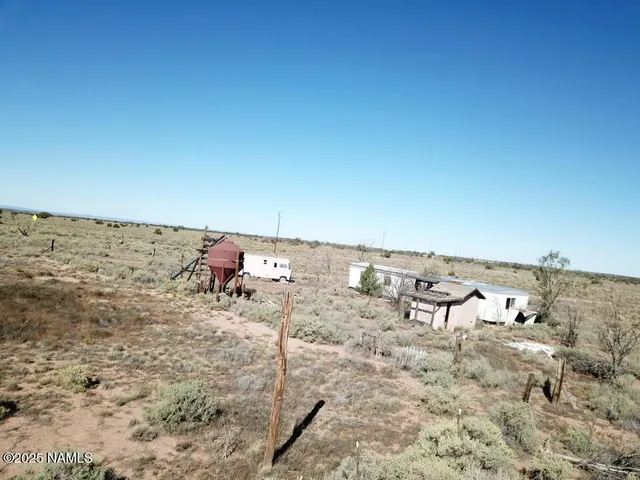 an aerial view of beach and ocean