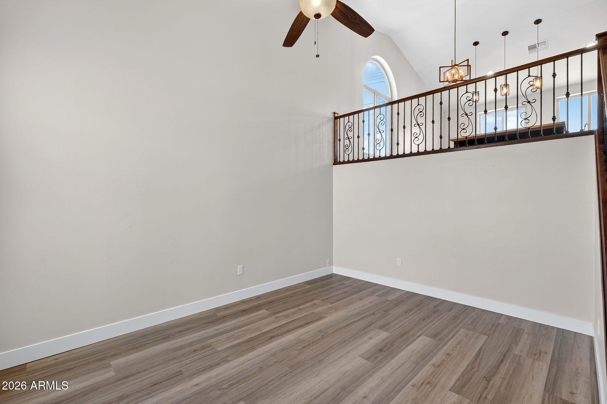 1417 East Mineral Road Gilbert, AZ 85234 - Photo 9 of 59 a view of entryway with wooden floor