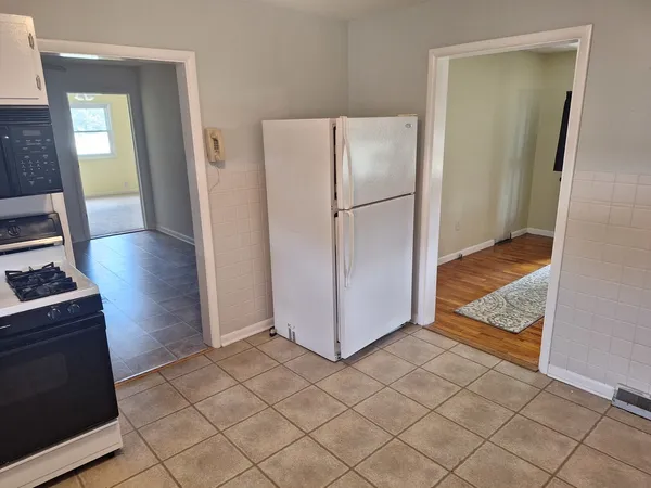 an empty room with white door