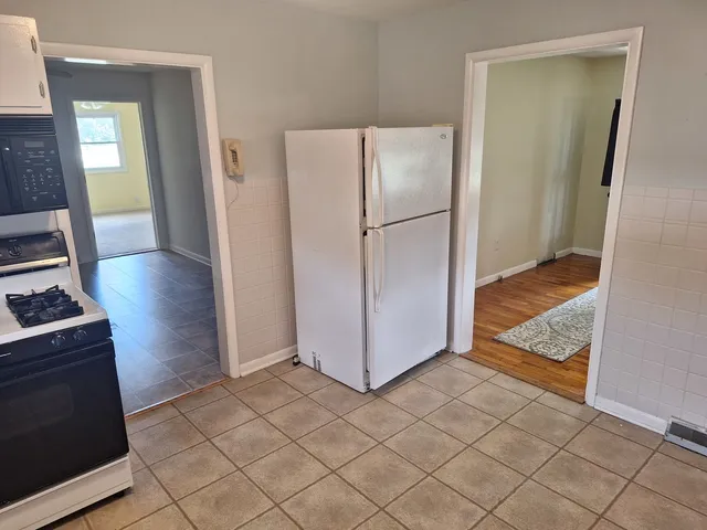 an empty room with white door