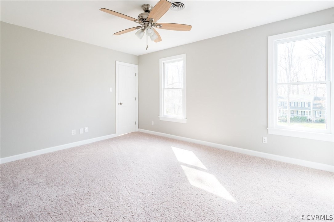 13130 Queensgate Road Midlothian, VA 23114 - Photo 30 of 42 a view of an empty room with a window