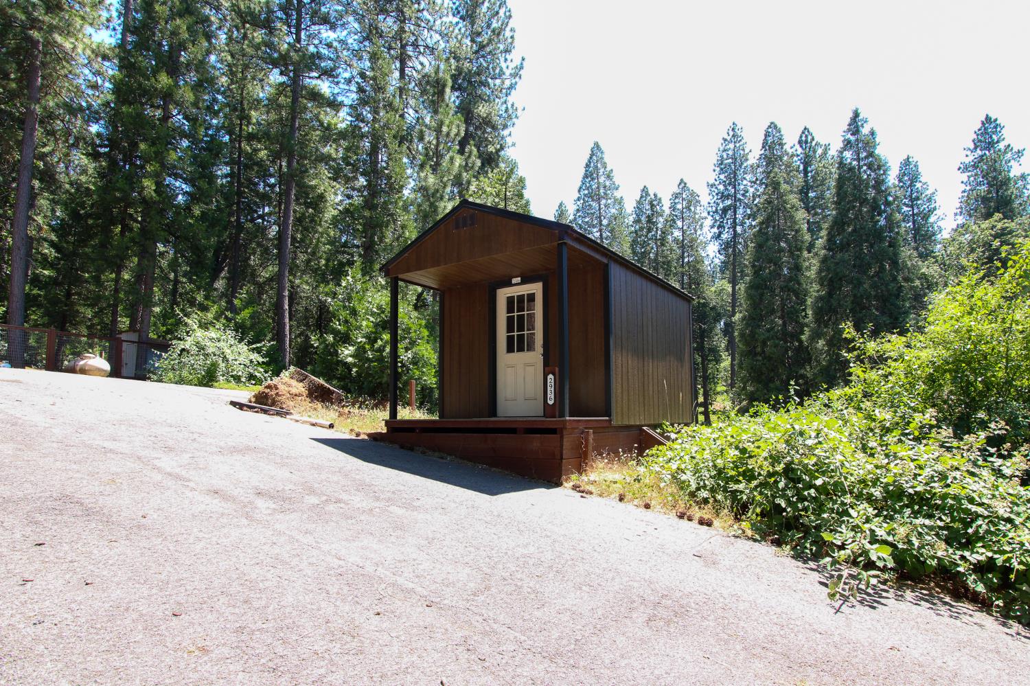 2936 E Highway Murphys, CA 95247 - Photo 17 of 41 a front view of a house with a garden