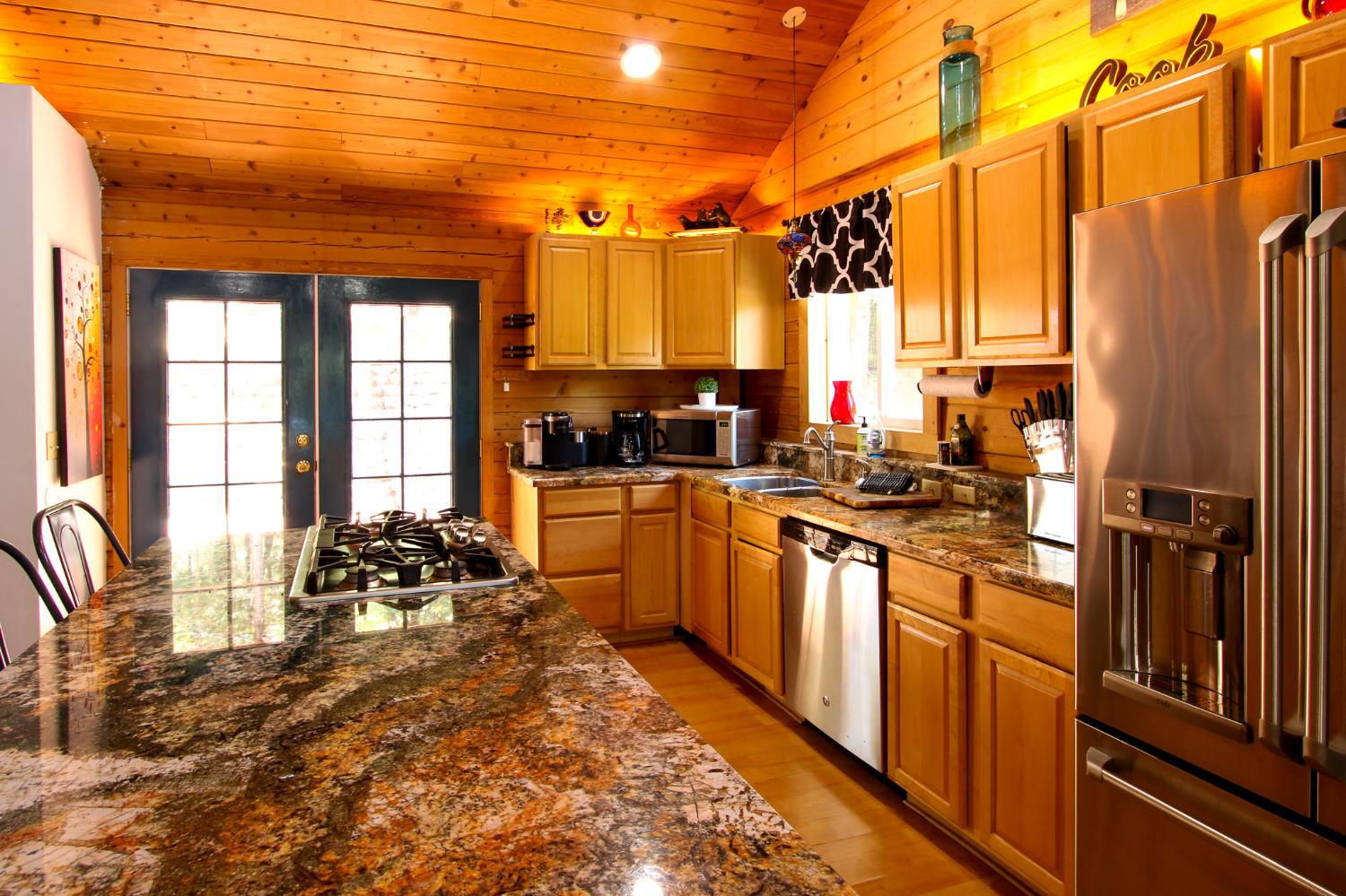 2936 E Highway Murphys, CA 95247 - Photo 23 of 41 a kitchen with a large window appliances and cabinets