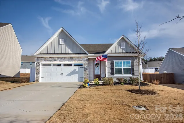 a front view of a house with garage