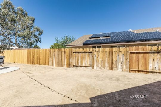 421 Christopher Court Ridgecrest, CA 93555 - Photo 40 of 50 a front view of a house with a outdoor space