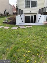 139 Balc Spring Leesburg, VA 20175 - Photo 17 of 18 a view of a house with a yard