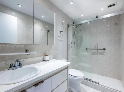 a view of room with wooden floor