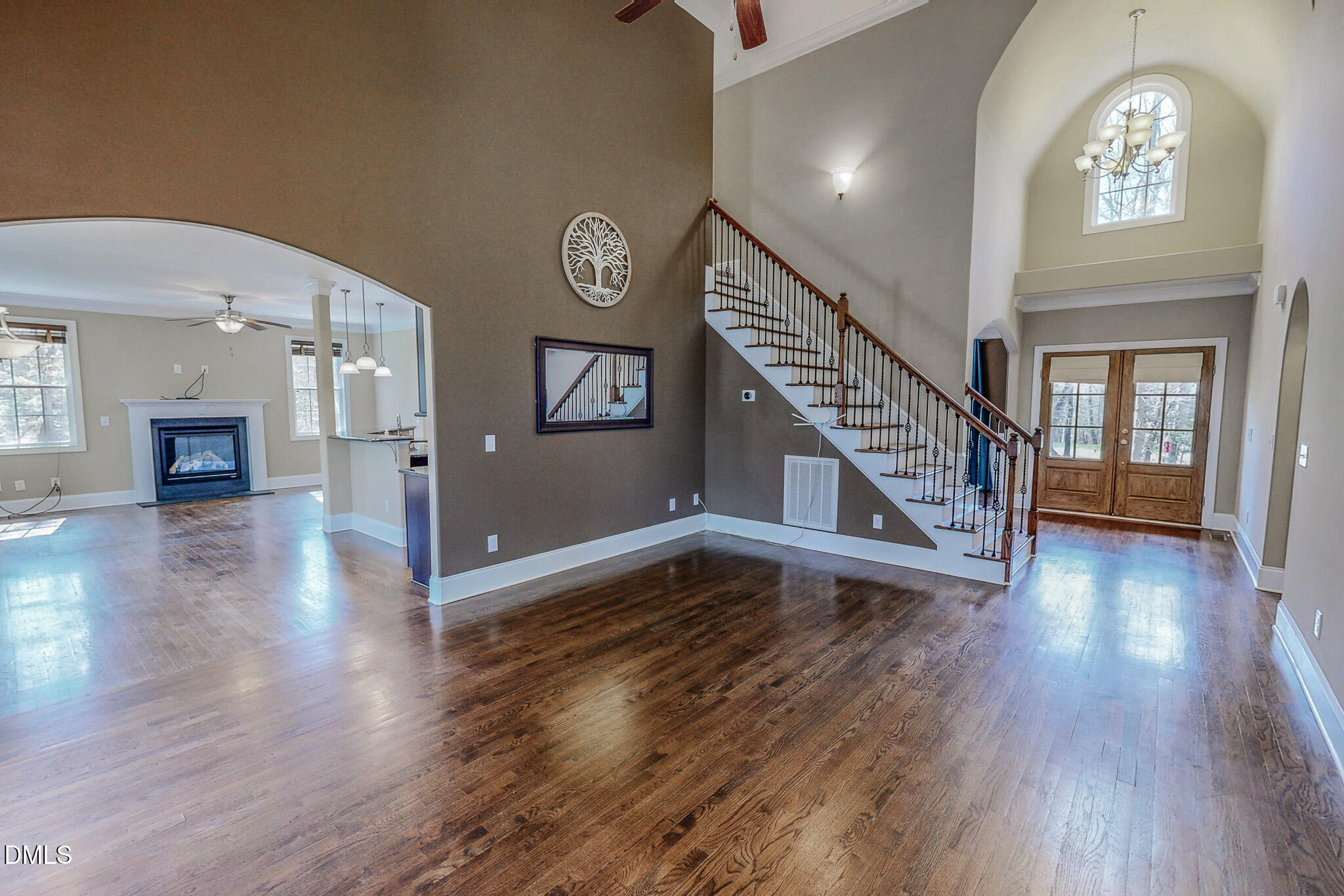 128 Cardens Cove Road Timberlake, NC 27583 - Photo 2 of 54 a view of an entryway with wooden floor and a front door