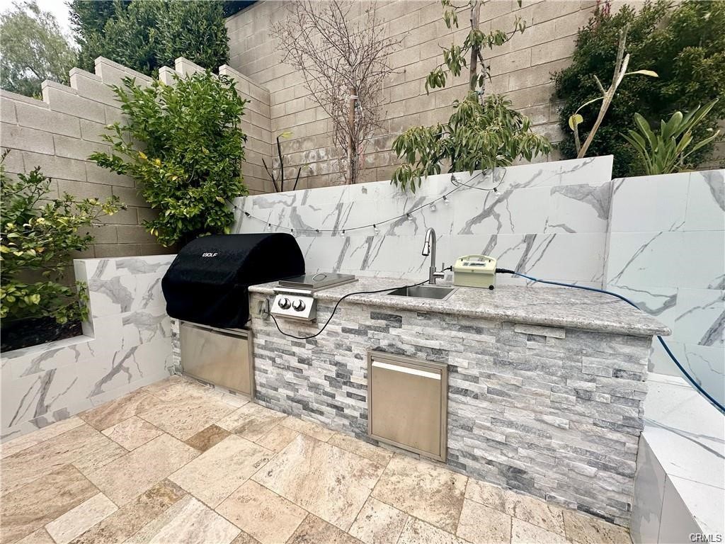 63 Cetus Irvine, CA 92618 - Photo 9 of 9 a view of a terrace with a bench