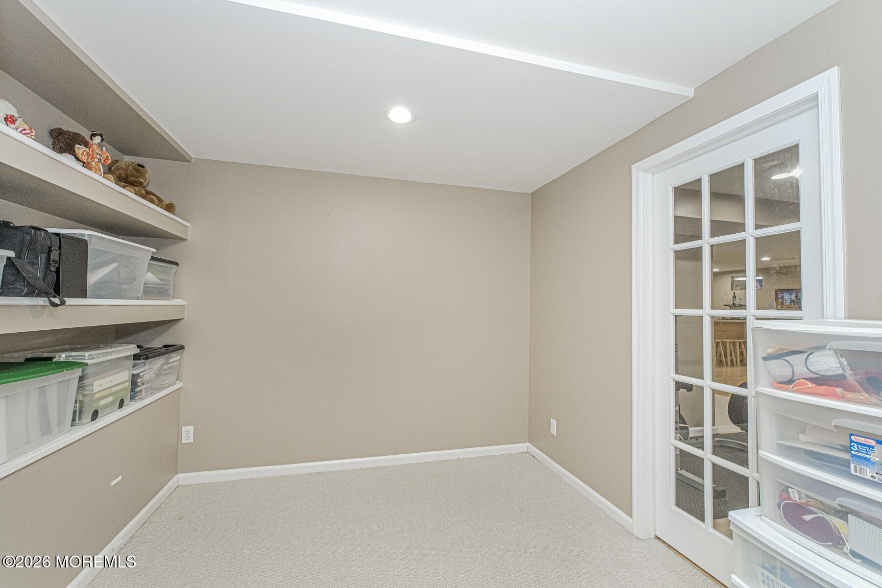 315 Wedgewood Road Morganville, NJ 07751 - Photo 23 of 37 a view of storage and utility room with empty racks