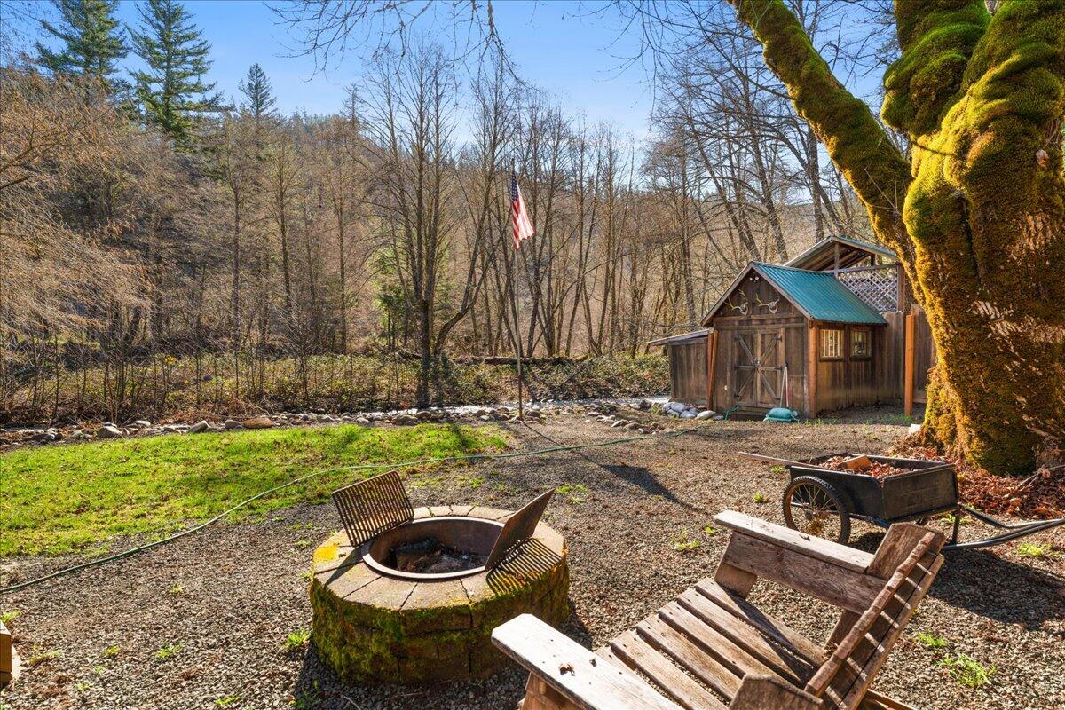 9972 Elk Creek Road Prospect, OR 97536 - Photo 32 of 46 Firepit Overlooking Creek