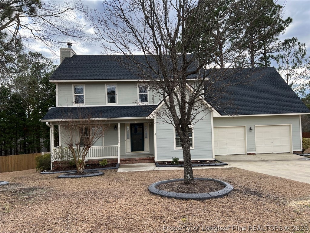 a front view of a house with porch