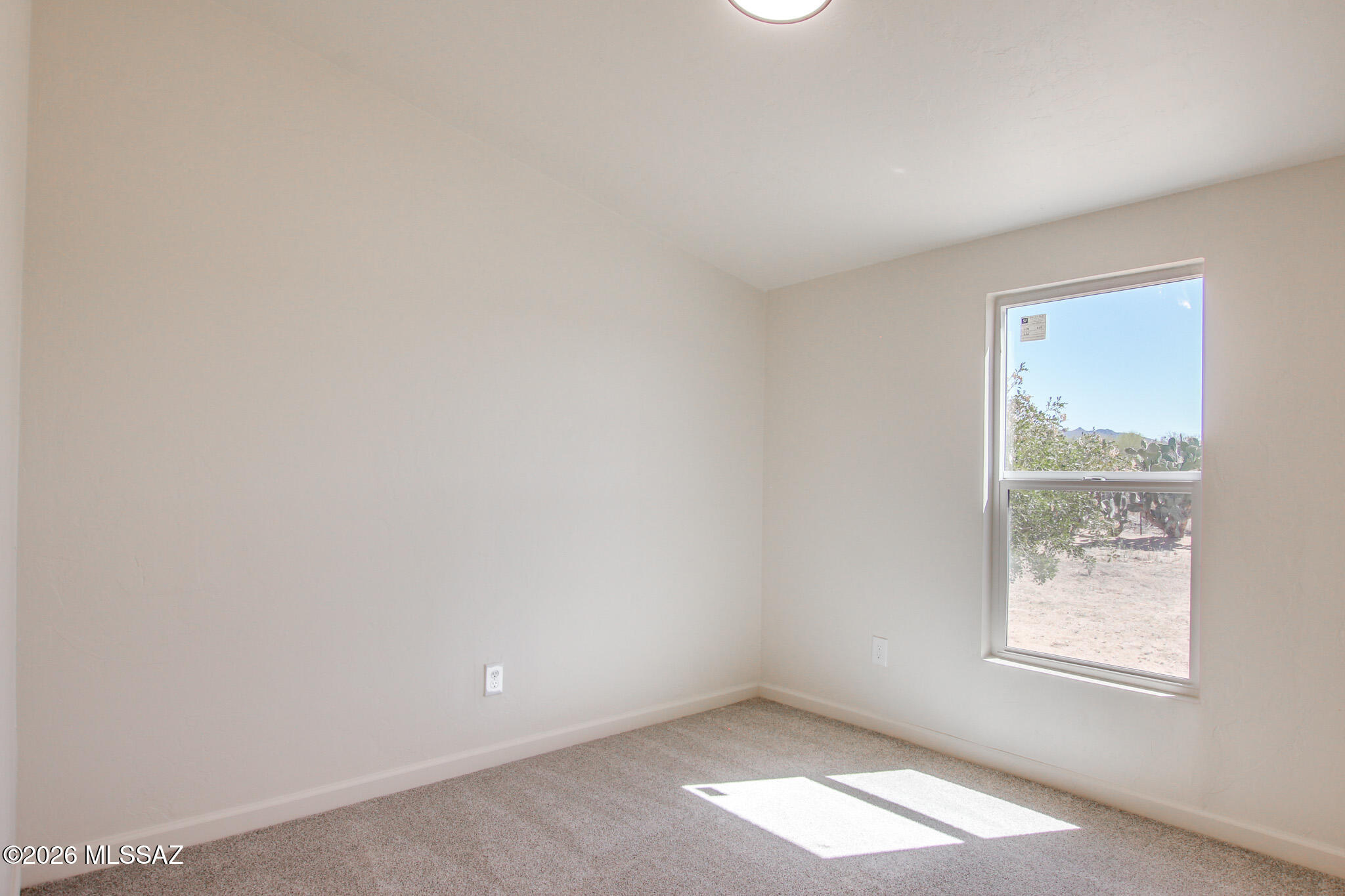 14303 West Rolina Lane Tucson, AZ 85736 - Photo 16 of 38 an empty room with a window