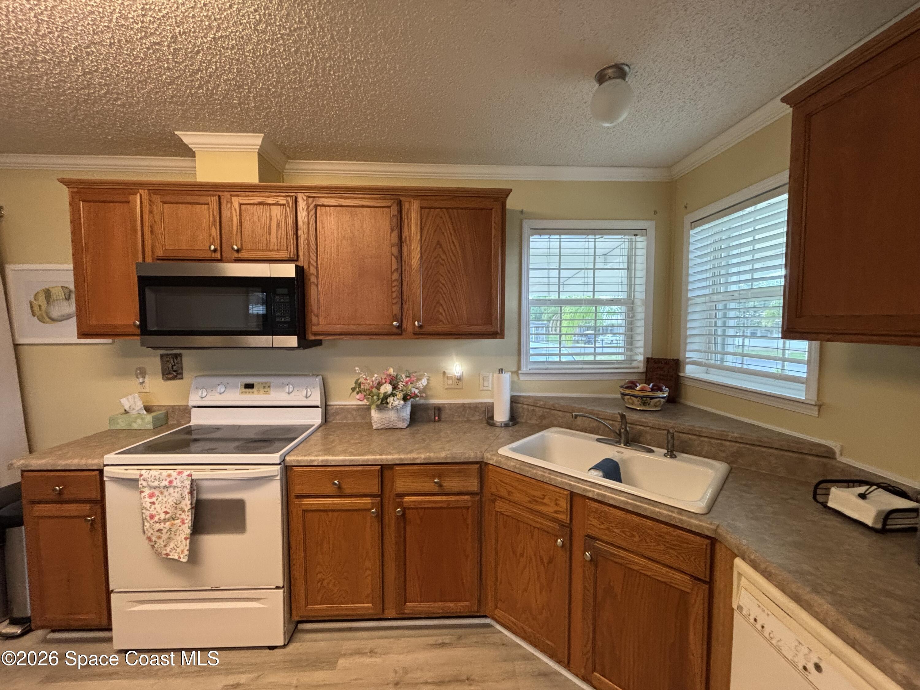 6165 98th Road Sebastian, FL 32958 - Photo 21 of 23 Kithen Corner Sink-Stove