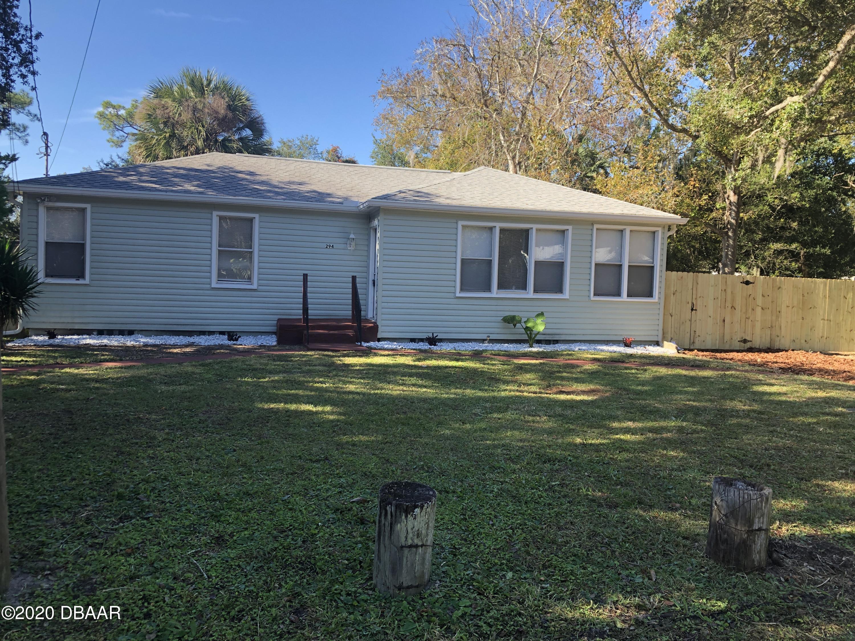 a view of a house with a swimming pool