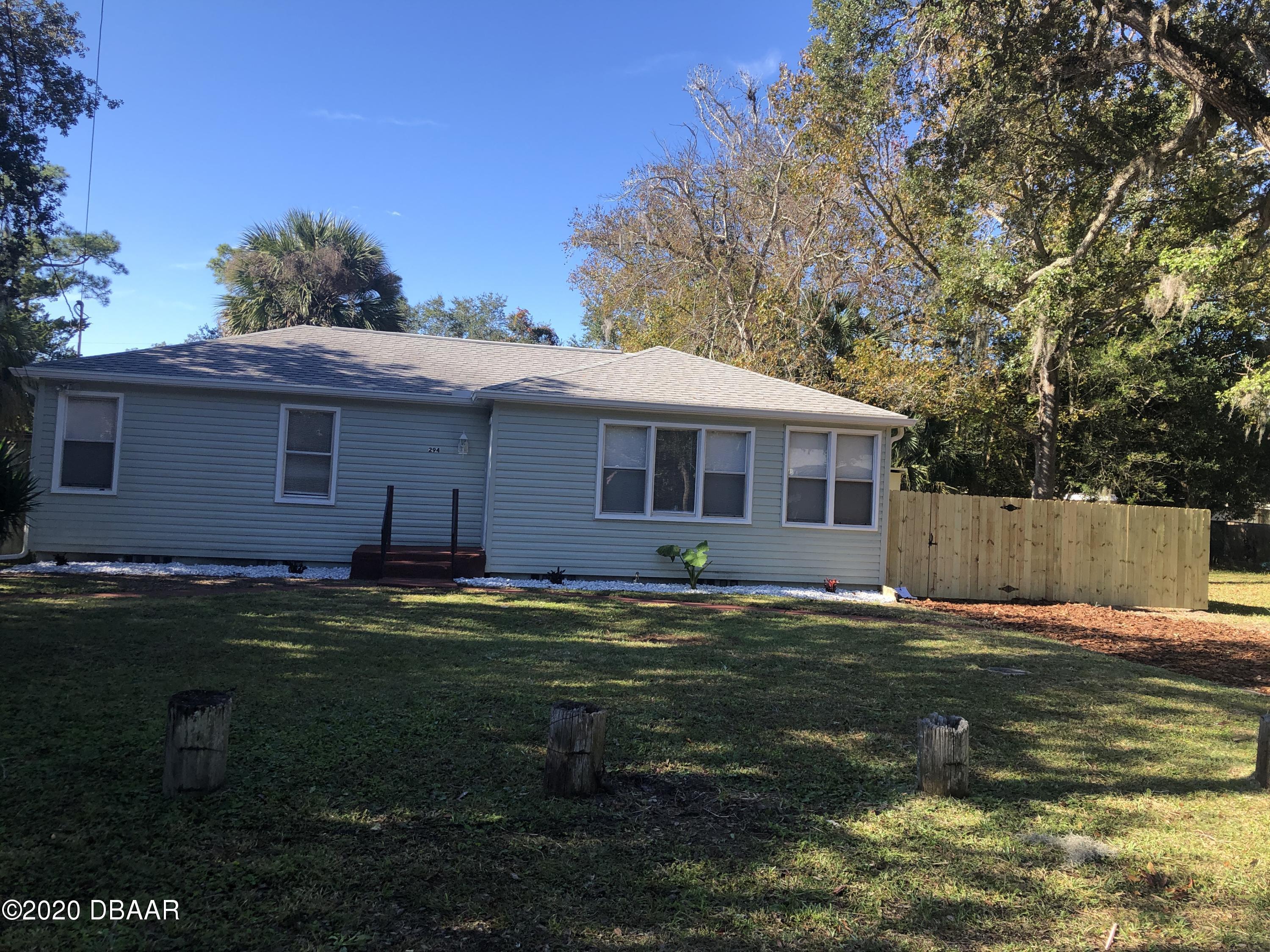 294 Roosevelt Drive Ormond Beach, FL 32174 - Photo 2 of 18 a backyard of a house