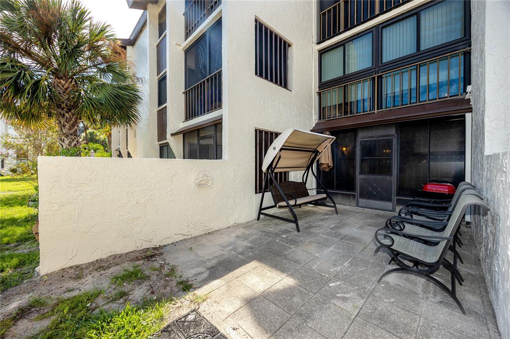 2207 Belleair Road, Unit B4 Clearwater, FL 33764 - Photo 23 of 37 a view of outdoor space with seating area