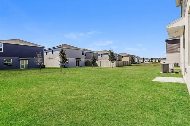 a view of a house with a big yard