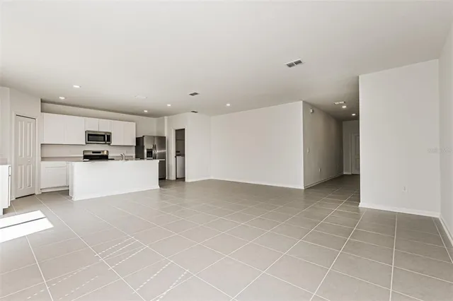 a view of a kitchen with a sink